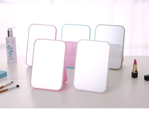 Collage of portable square makeup mirrors with folding stands in multiple pastel colors