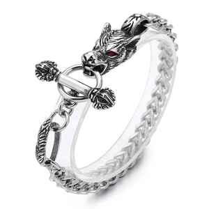 Gothic wolf head bracelet in vintage steel with red eyes and intricate engraved links