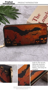 Macro view of Halloween wallet texture featuring pumpkin prints and golden metal zipper details