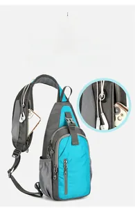 Detail view of the waterproof shoulder bag showing the practical earphone hole design