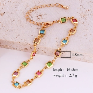 Detailed macro view of 18K gold-plated necklace featuring square colorful zircons
