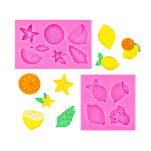 Pink silicone molds for mini lemon slices and carambola shapes with fruit resin samples