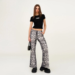 Slim fit black T-shirt and high waisted leopard print flared trousers set for women