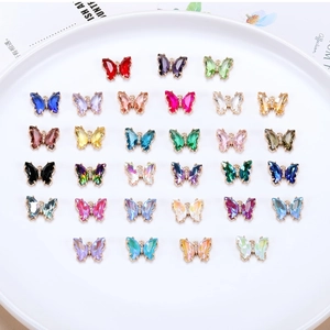 Detail of 26 gradient crystal butterfly pendants with metal frames for DIY jewelry