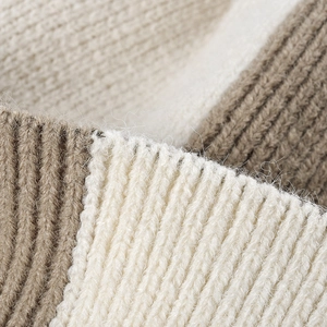 Women's warm winter knitted beanie hat with fleece lining and ribbed texture in beige colors