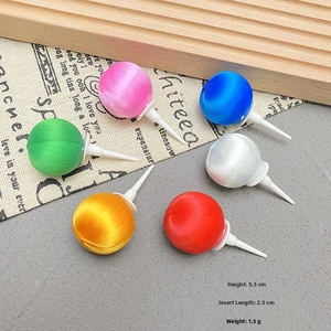 Close-up of 5.5cm colorful silk thread ball cake toppers with 2.5cm plastic picks