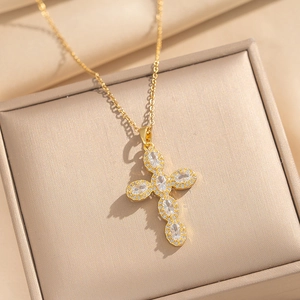 Gold stainless steel cross necklace with oval clear zircons on premium silk fabric