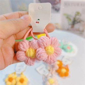 Élastiques à cheveux fleurs tricotés main rose et jaune avec texture en laine douce