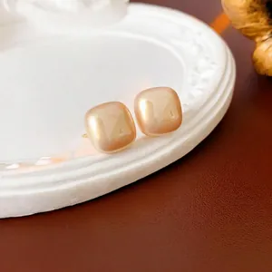 14K gold plated square champagne pearl stud earrings with elegant minimalist aesthetic