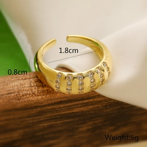 Detail showing ring dimensions 1.8cm diameter and 0.8cm width with gold zircon inlay
