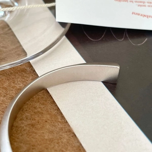 Minimalist S925 sterling silver twisted open bangle with matte brushed metal finish