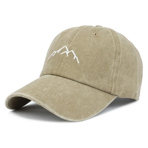 Close-up of khaki washed cotton baseball cap featuring white minimalist mountain embroidery