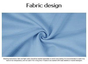 Detailed view of light blue soft knit fabric texture with English washing instructions