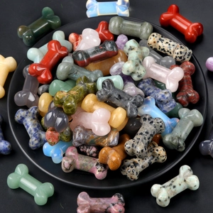 Mix of colorful natural crystal agate bone-shaped carvings in various stone textures