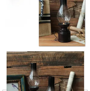 Dettaglio della lampada a cherosene vintage in resina con base in metallo antico