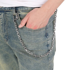 Punk silver wolf head stainless steel pant chain shown on blue jeans for men