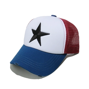 Macro detail of tricolor mesh trucker hat with 3D star embroidery and distressed brim