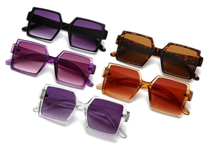 Detailed view of square oversized sunglasses in black, amber, purple and orange colors