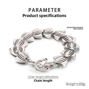 Detail of punk stainless steel fishtail link bracelet with heart anchor toggle clasp