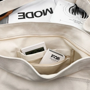 Sac fourre-tout vintage en toile blanc crème avec poche zippée et compartiments internes