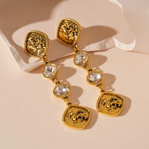 Boucles d'oreilles pendantes lion vintage dorées avec cristaux et pampilles en métal