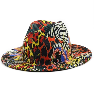 Detail of colorful graffiti fedora with leopard and zebra print patterns on felt fabric