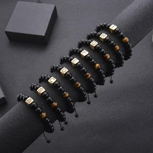 Stack of Black Onyx and Tiger Eye Bead Bracelets with Gold Inlaid Letter Charms A-I
