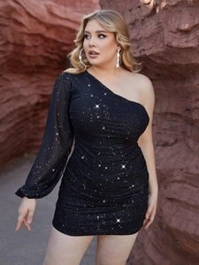 Detail view of sparkly black plus size dress with one-shoulder sequin fabric and ruched waist