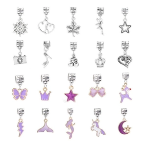 Detailed grid of 20 silver and purple alloy charms with snowflake and unicorn shapes