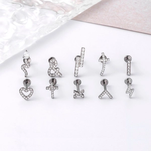 Titanium F136 piercing studs with zircon inlay in heart, cross, snake and lightning shapes