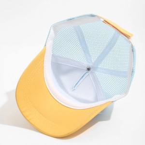 Detail view of the breathable mesh structure and interior stitching of the kid baseball cap