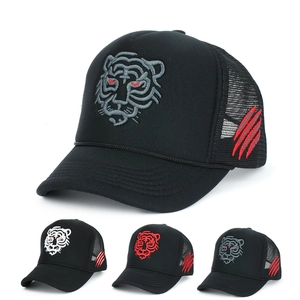 Fashionable trucker hat with detailed tiger embroidery and breathable mesh panels