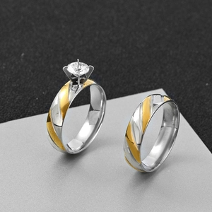 Two-tone 6mm stainless steel couple rings with diagonal stripes and six-prong zircon stone
