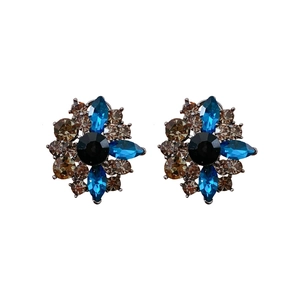 Vintage floral stud earrings with black center gem and blue marquise stones in retro style