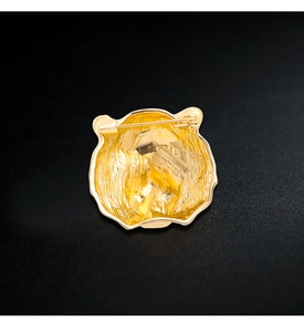 Detailed back view of a gold-plated tiger head brooch showing the secure pin fastener