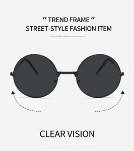 Detailansicht der runden Retro-Sonnenbrille mit schmalem schwarzem Metallrahmen