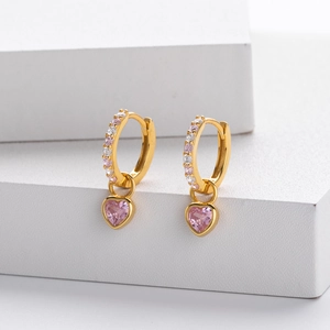 Detailed view of S925 silver heart earrings with pink and white cubic zirconia stones
