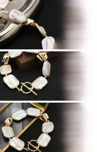 Detail of baroque pearl bracelet with 18K gold toggle clasp and hammered texture