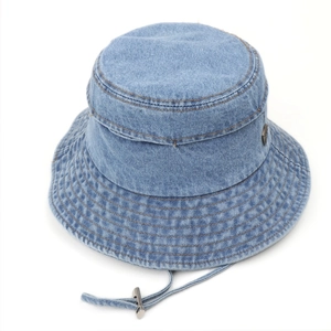 Detail of light blue denim bucket hat featuring multi-row brim stitching and adjustable drawstring