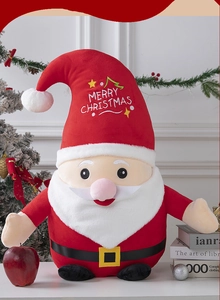 Detail of Santa plush toy with Merry Christmas embroidery and festive holiday decor