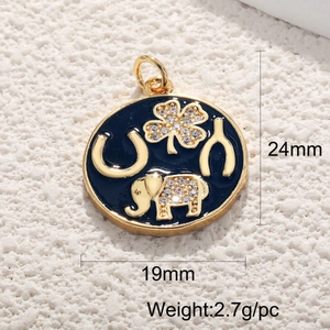 Detailed view of a gold-plated charm pendant with clover and elephant motifs, 19x24mm