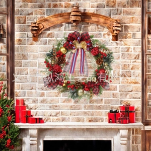 Close-up of Christmas wreath with buffalo plaid bow, pine cones and red berries decor