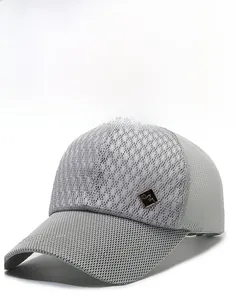 Close-up of dark grey mesh baseball cap featuring breathable fabric and a mountain crest detail