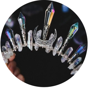 Handmade mystic crown with natural clear crystals and a crescent moon metal centerpiece