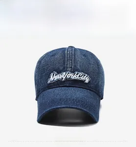 Close-up of vintage blue denim baseball cap with New York City 3D embroidery detail
