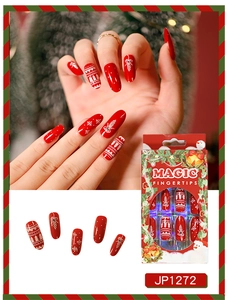Detailed Christmas press on nails set with red and white snowflake patterns and gift box