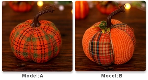 Detail of checkered and corduroy fabric pumpkins for harvest festival tabletop decoration