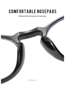 Macro detail of comfortable integrated nose pads on round black frame eyeglasses
