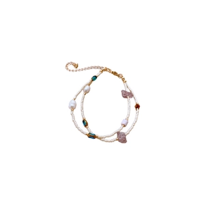 Double-layered beaded bracelet with freshwater pearls, turquoise beads and gold plating