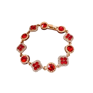 Bracelet vintage doré à maillons trèfles avec cristaux rouges et pavé de diamants